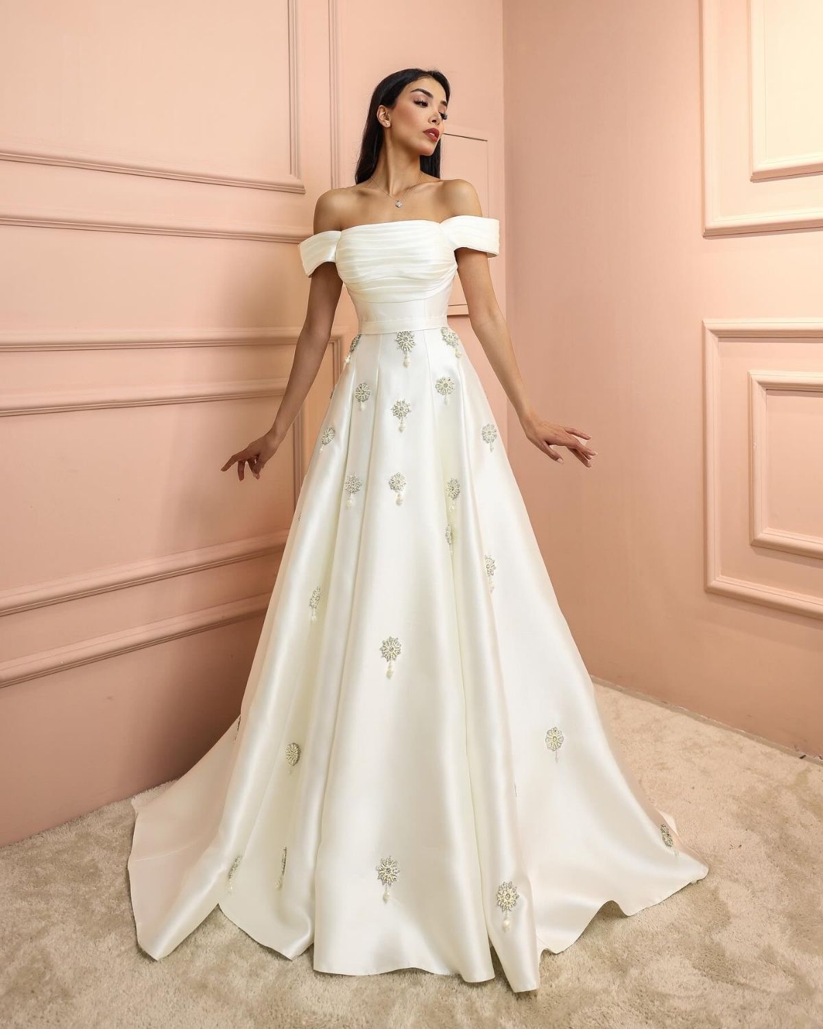 White embroidered off shoulder gown