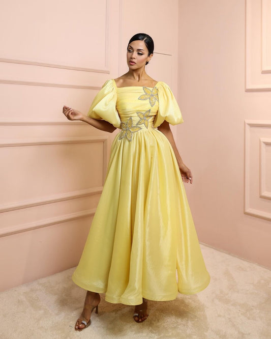 Yellow embroidered gathered dress