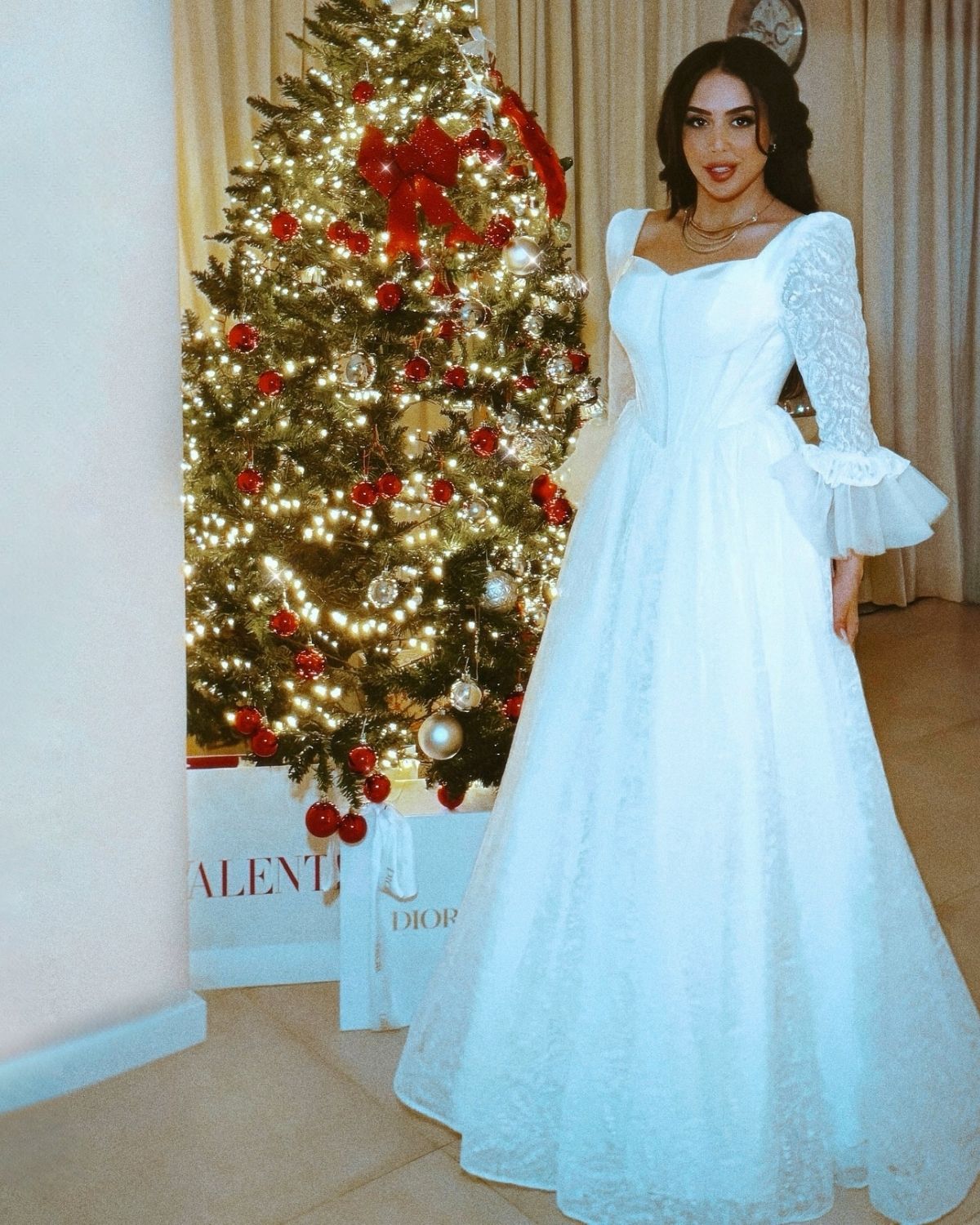 Rula Alazawi in White embroidered ball gown