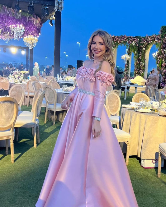 Alaa Abou Harb in Light pink off shoulder gown
