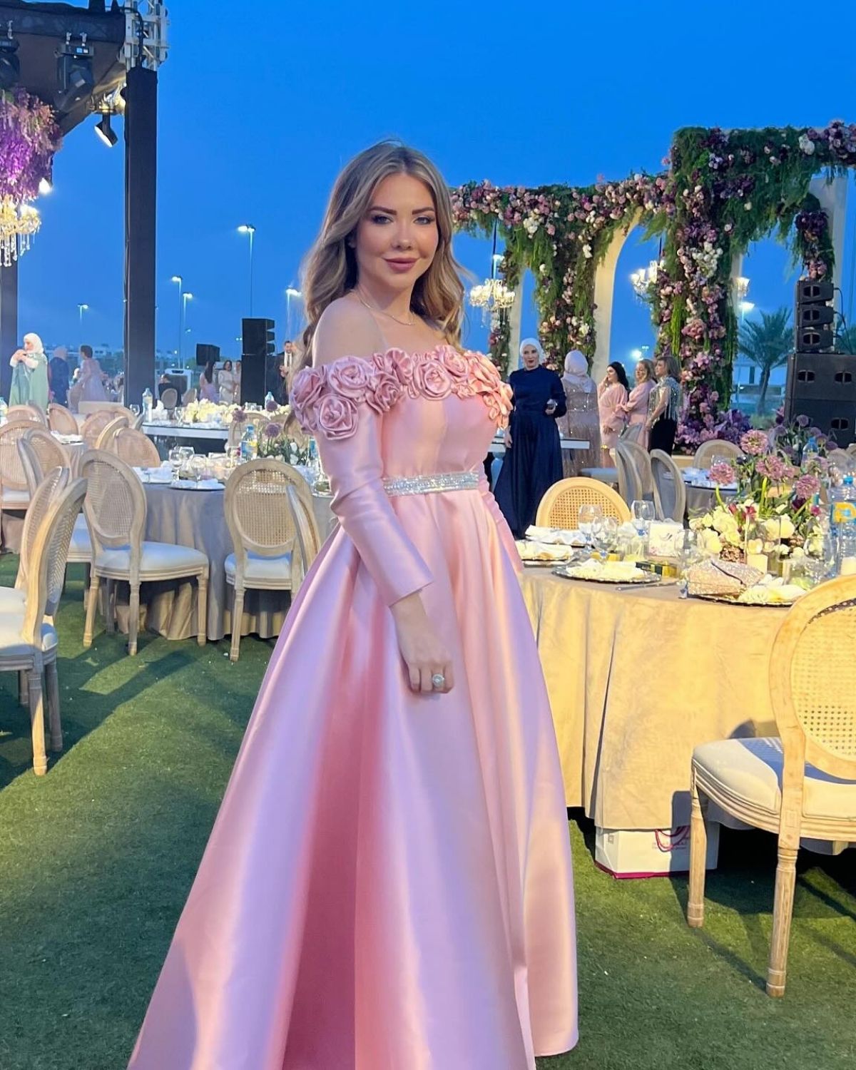 Alaa Abou Harb in Light pink off shoulder gown