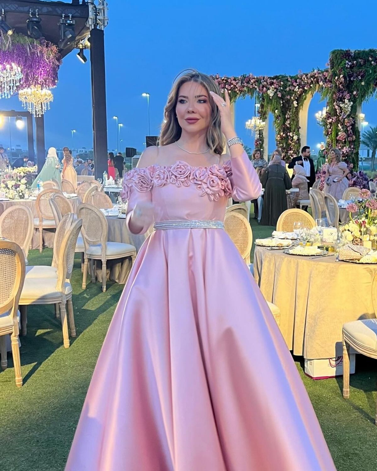Alaa Abou Harb in Light pink off shoulder gown