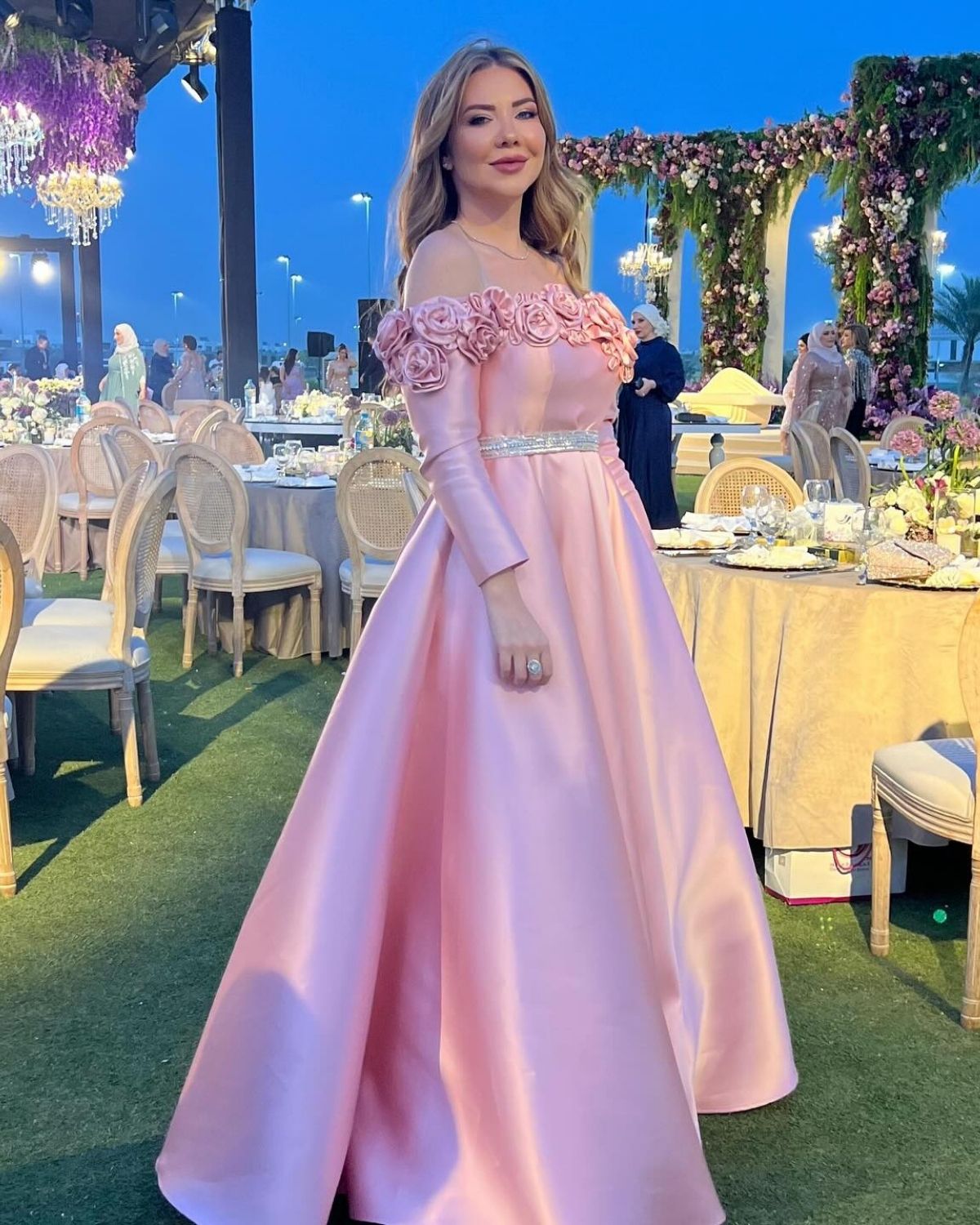 Alaa Abou Harb in Light pink off shoulder gown