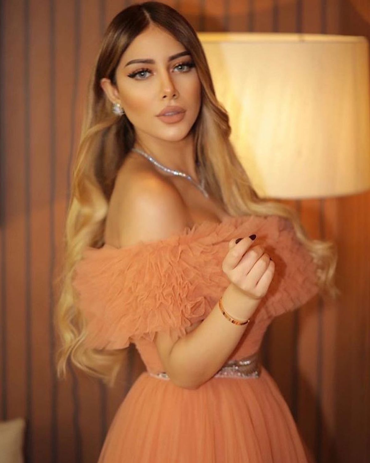 Yousra Saouff in peach off shoulder gown