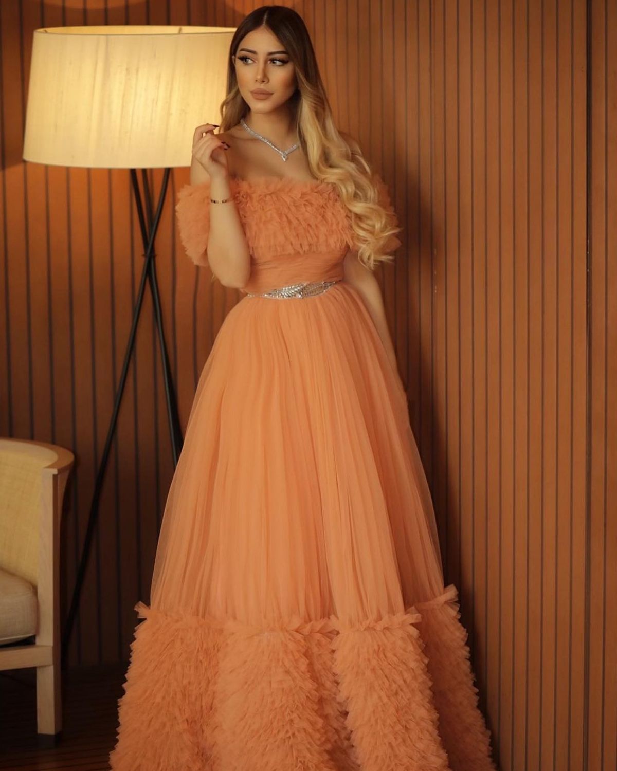 Yousra Saouff in peach off shoulder gown
