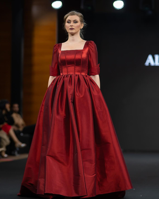 Red corset gathered ball gown