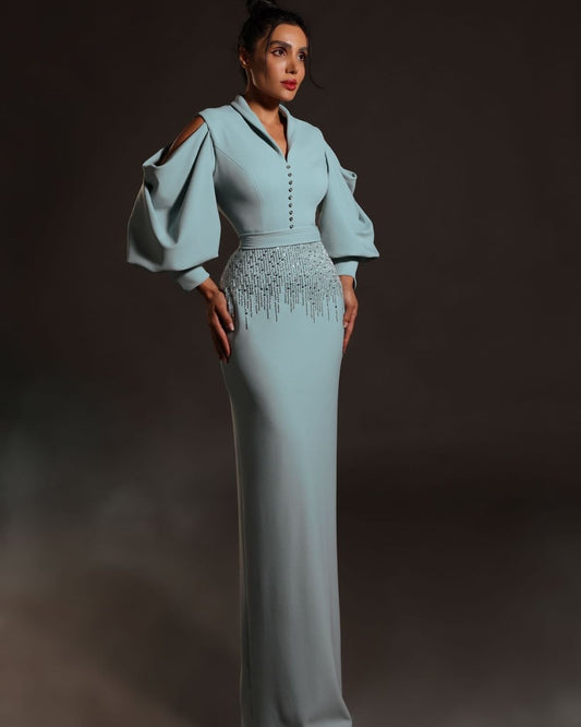 Pastel Blue bodycon gown with dramatic sleeve pattern