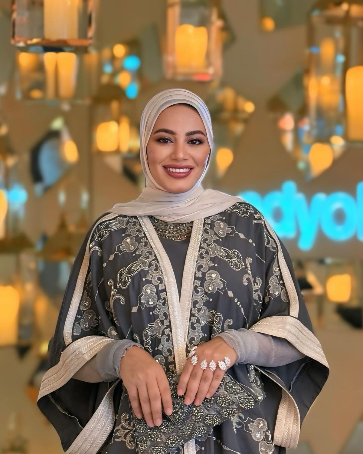 Raniaa Yehia in grey Abaya set