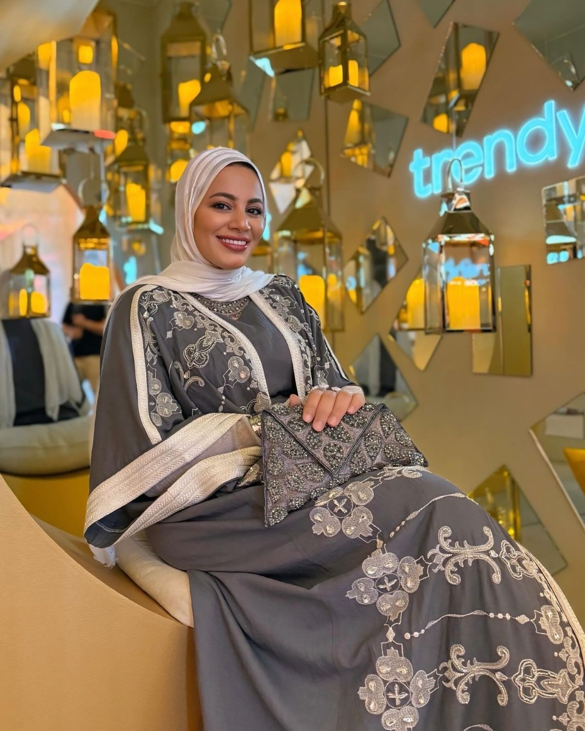 Raniaa Yehia in grey Abaya set