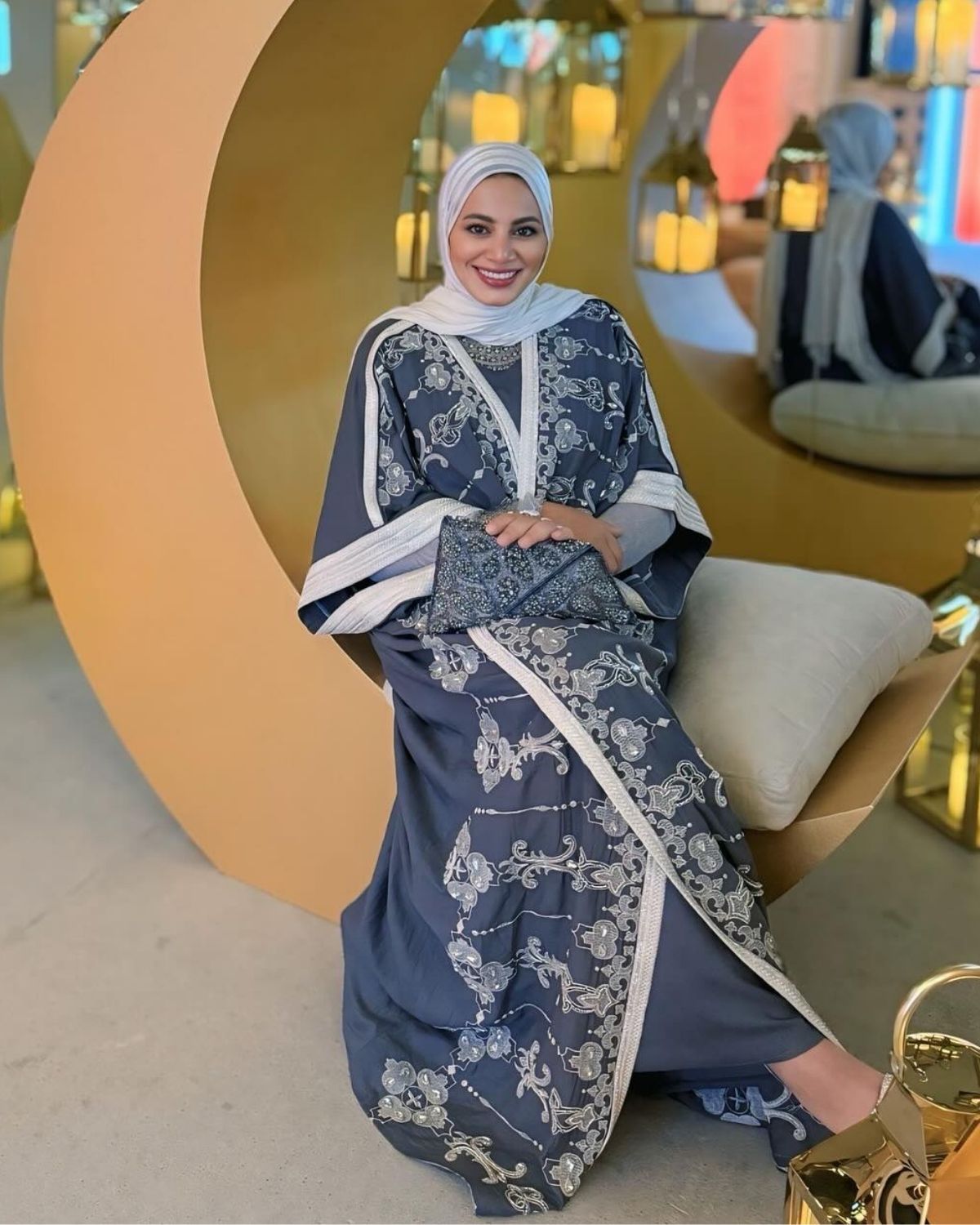 Raniaa Yehia in grey Abaya set